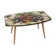 Table basse motif fleuri pieds fuseaux