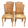 4 Louis XV dining chairs in light solid oak with caning.