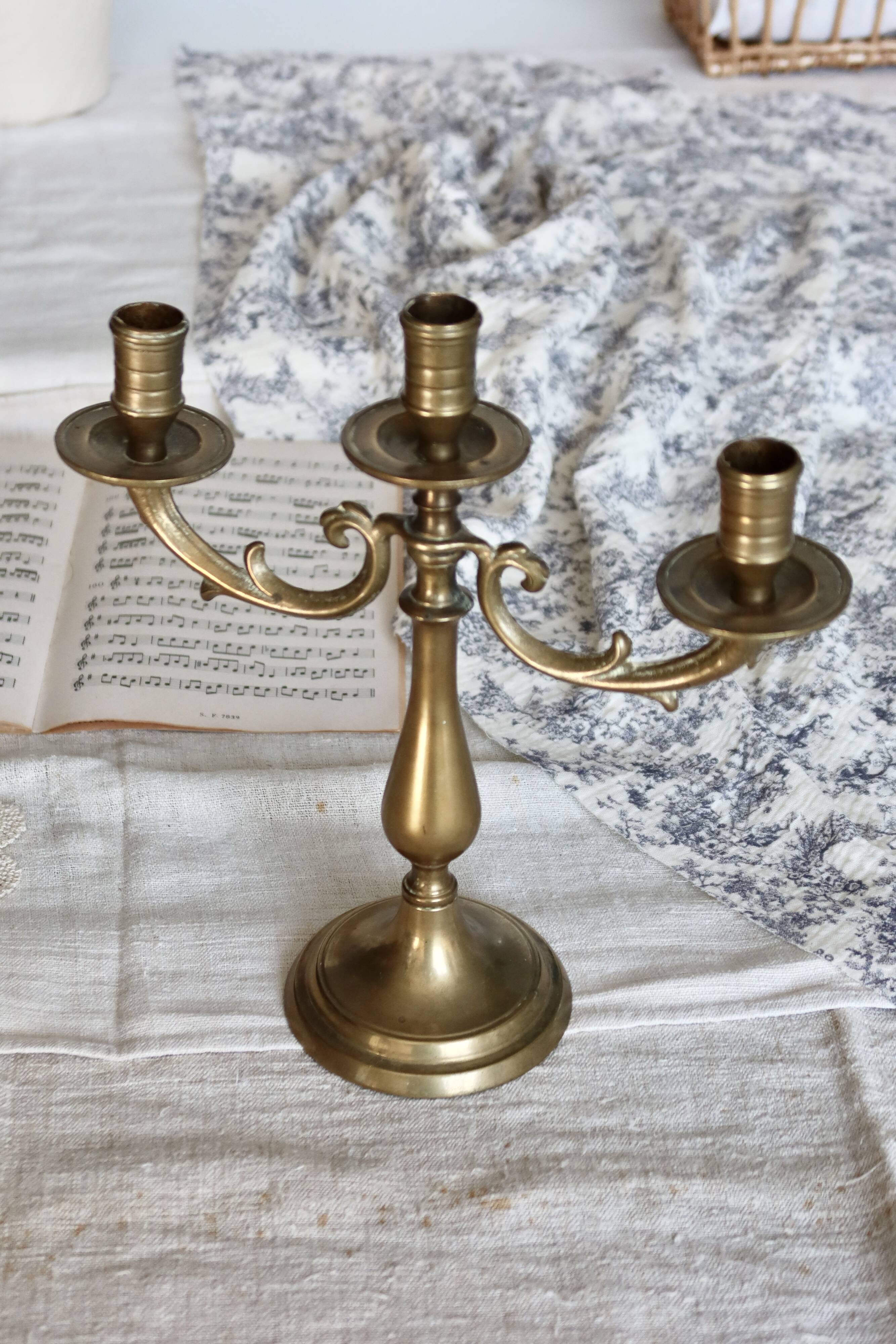 Antique 3-branch candelabra in patinated brass