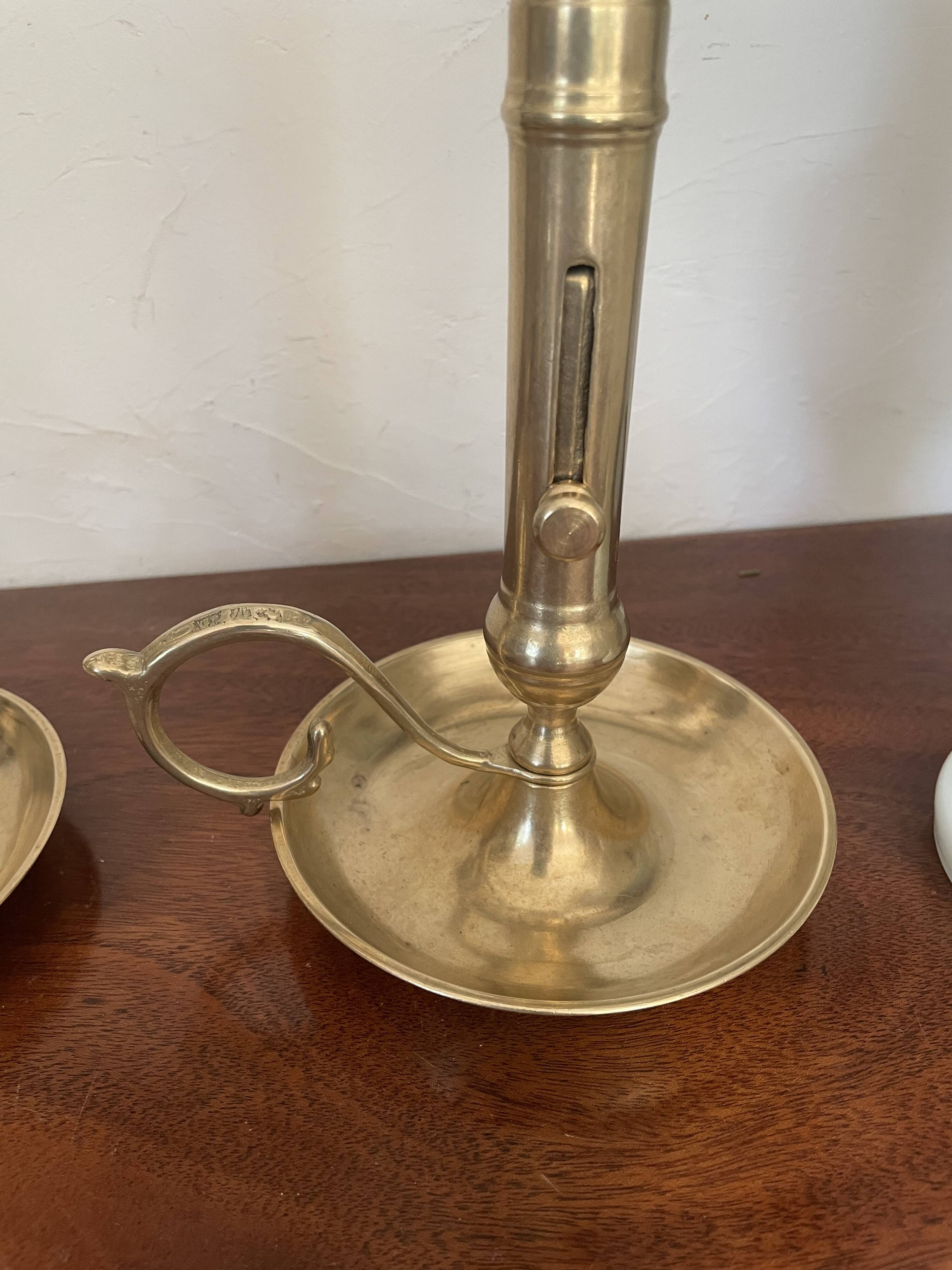 Pair of brass candle holders