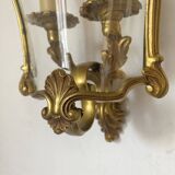 Wall lamp in Louis XV style in brass, shell decoration.