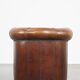 Sheep leather club chair in a cognac color and finished with piping