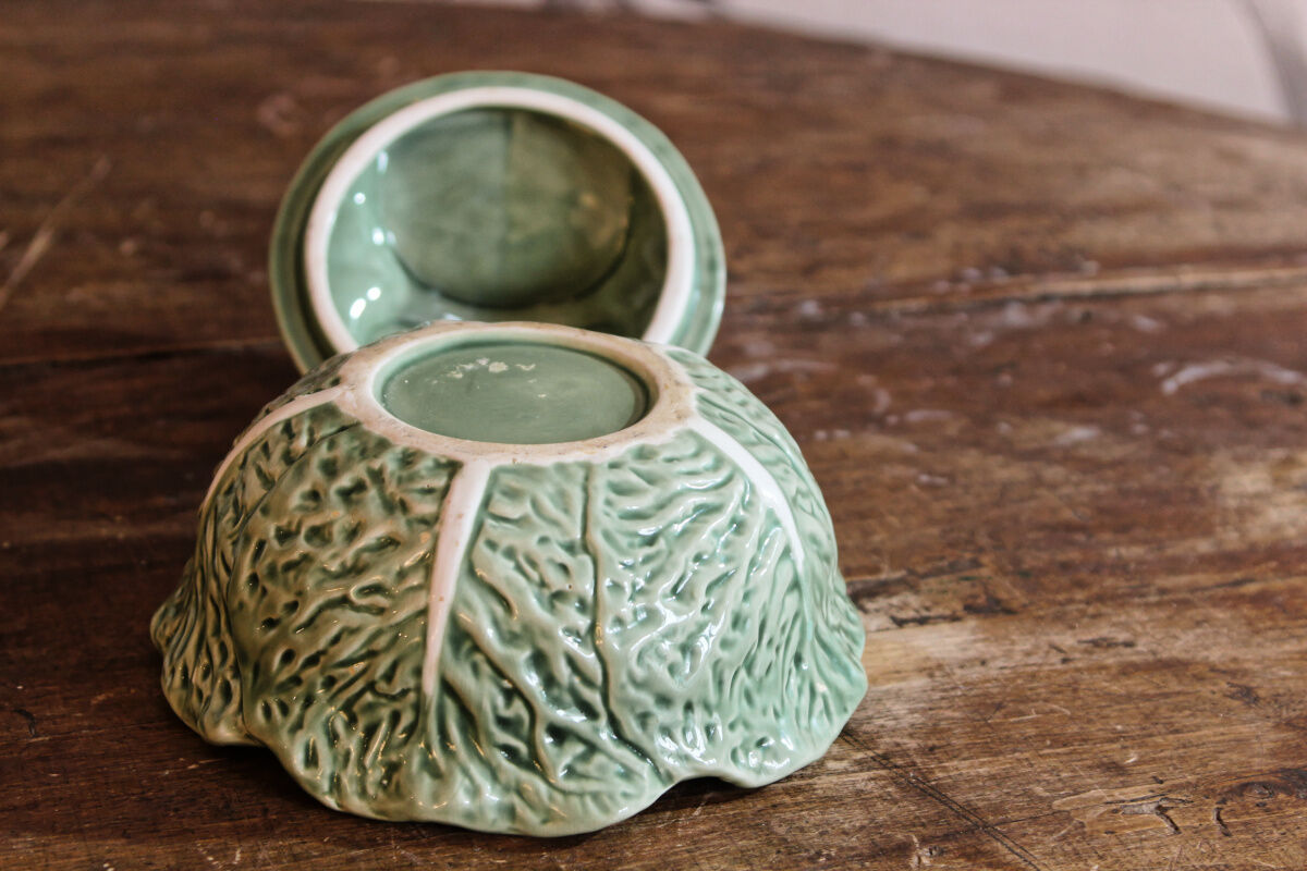 Covered pot in slip, collard greens