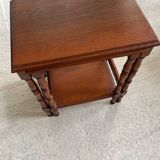 2 wooden nesting tables with molded legs