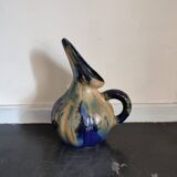Old flamed sandstone pitcher