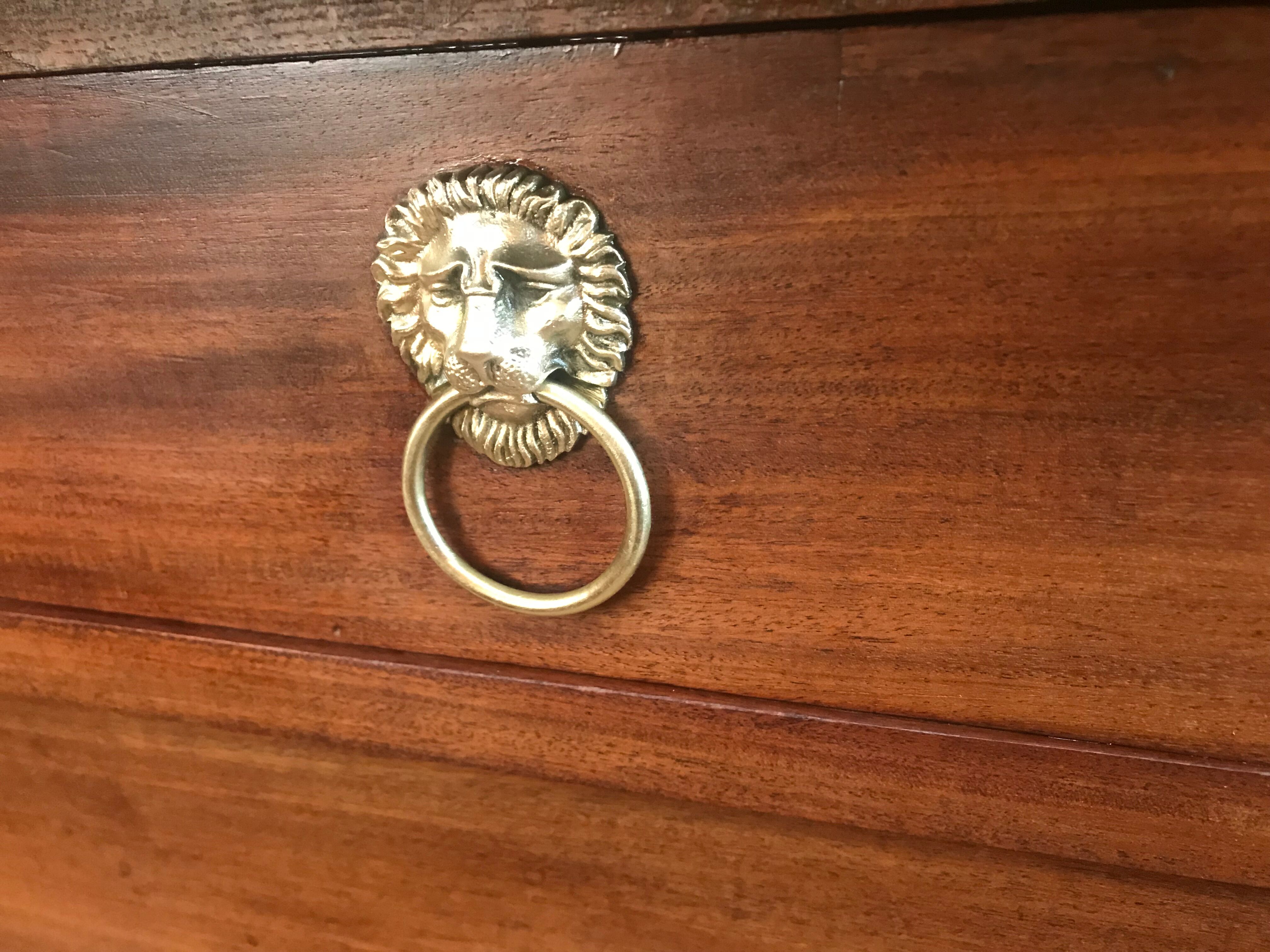 Chest of drawers lion pates back from Egypt