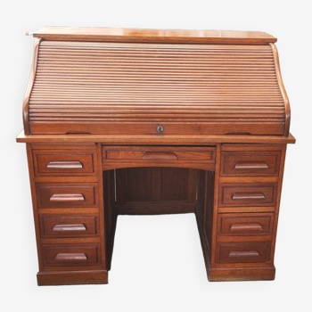 Old American desk in solid oak with S-shaped shutter