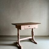 Rustic pink painted desk with brown tabletop