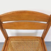 Vintage sleigh chair in beech wood and cane from the 70s and 80s