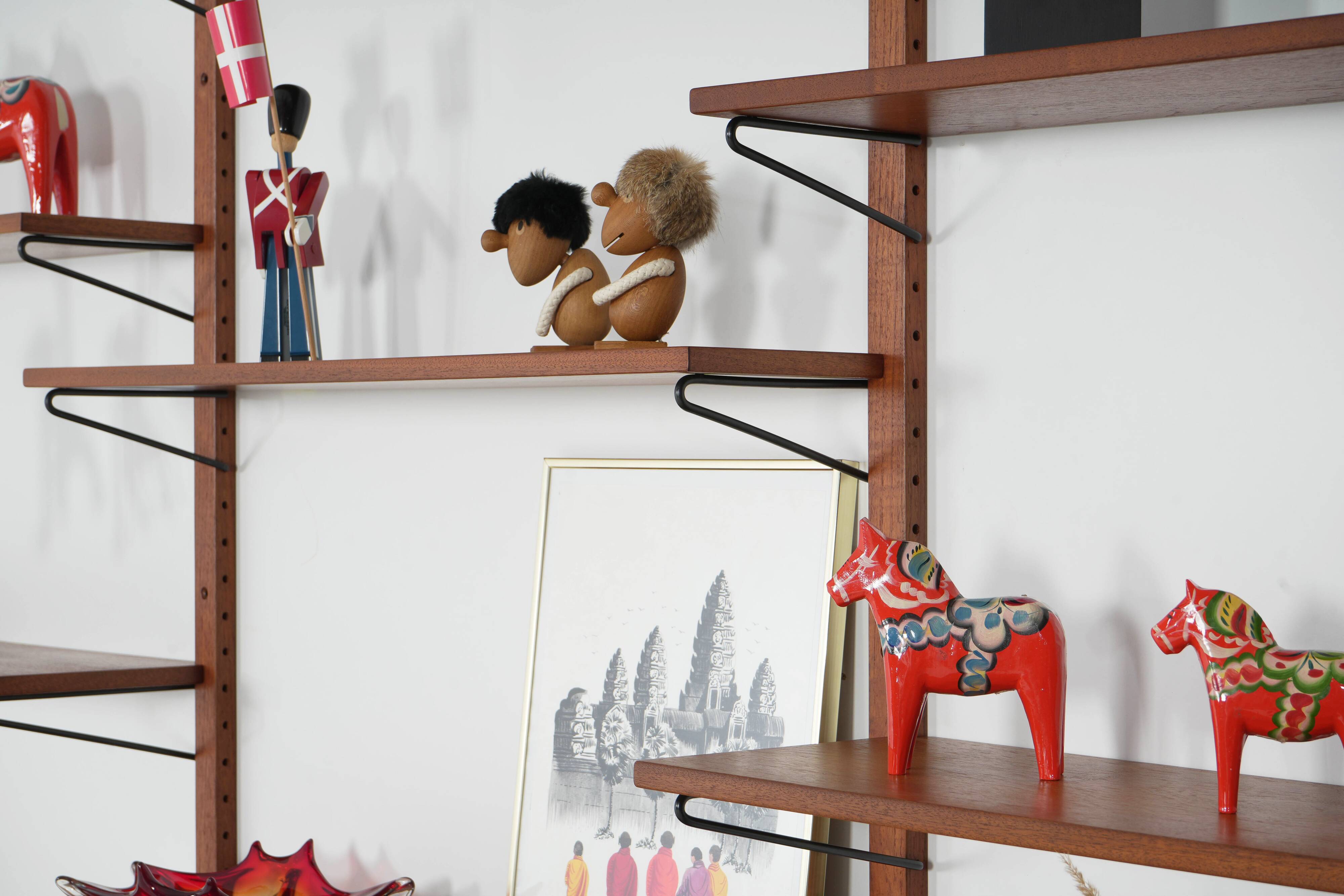 Modular shelving from the 1960s — Danish teak veneer wall system