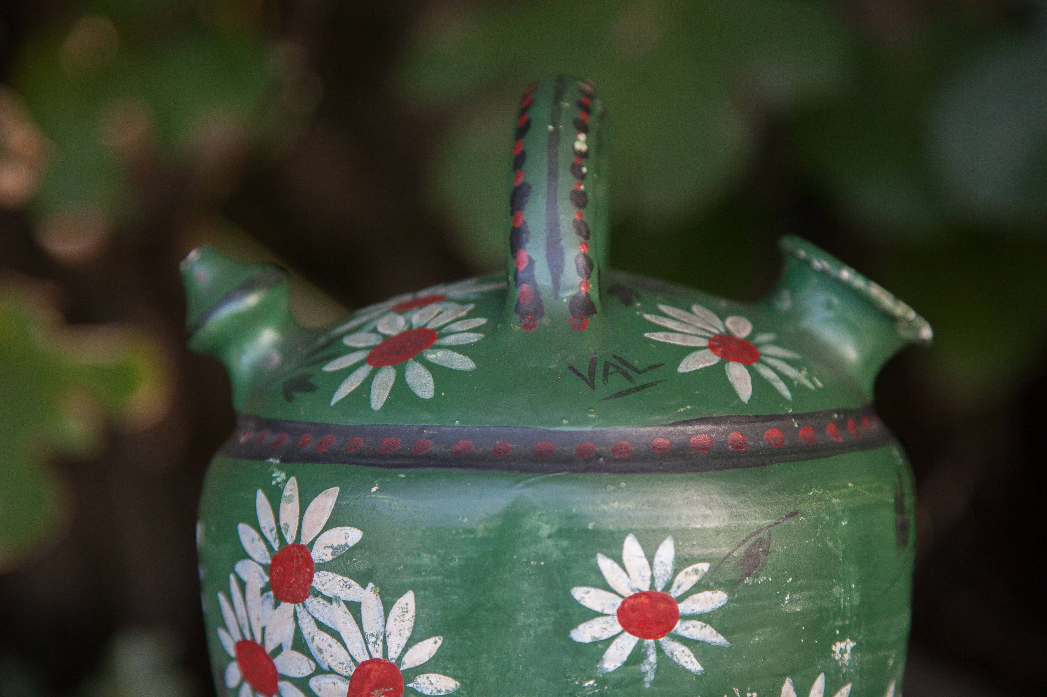Vintage gargoulette, jug, green painted pitcher with daisy patterns