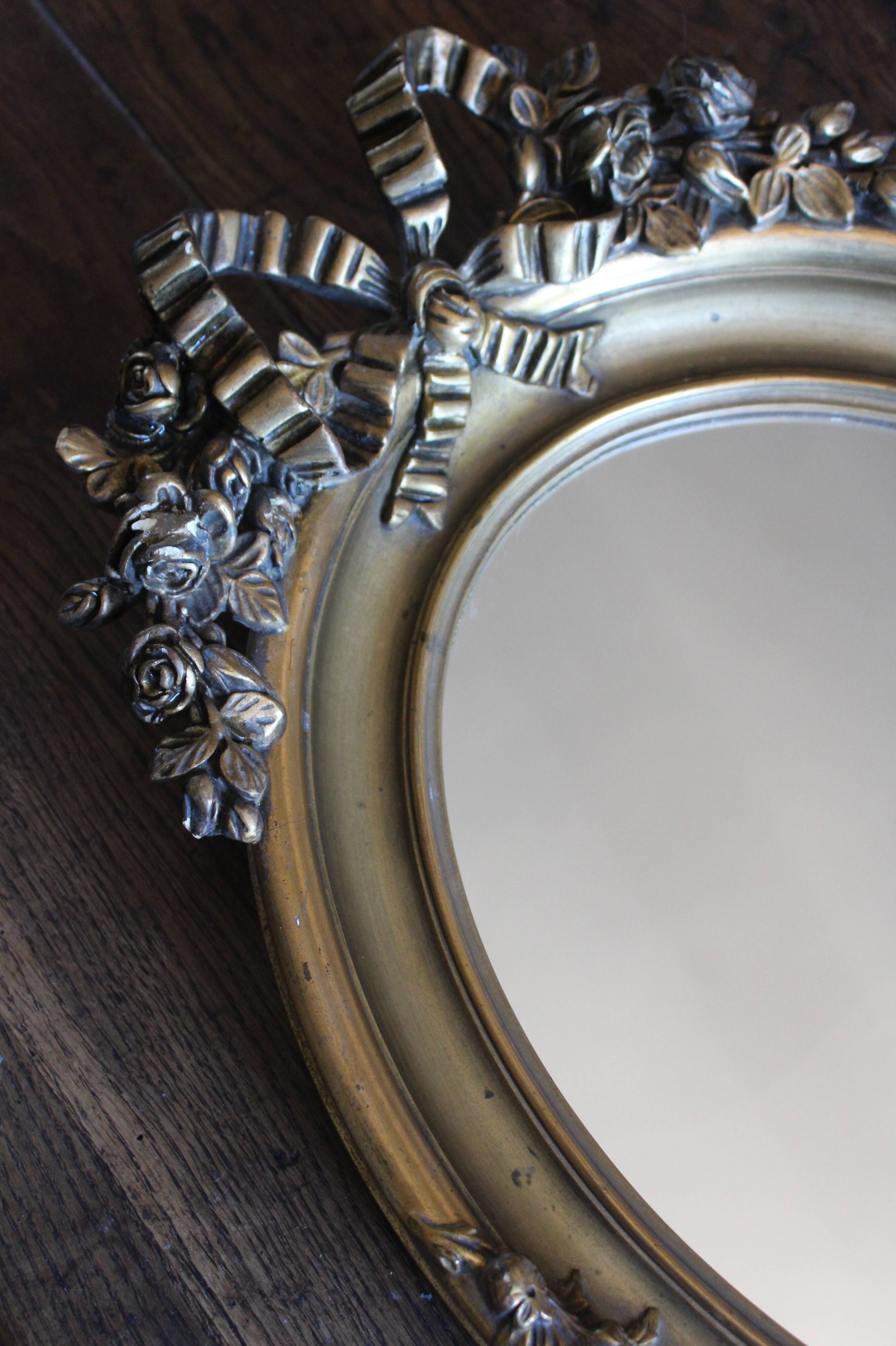 Golden Oval Mirror with Bow and Roses Decor