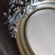 Golden Oval Mirror with Bow and Roses Decor