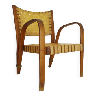 Bow wood armchair designed by Hugues Steiner 1950