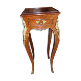 Harness in veneer and bronze