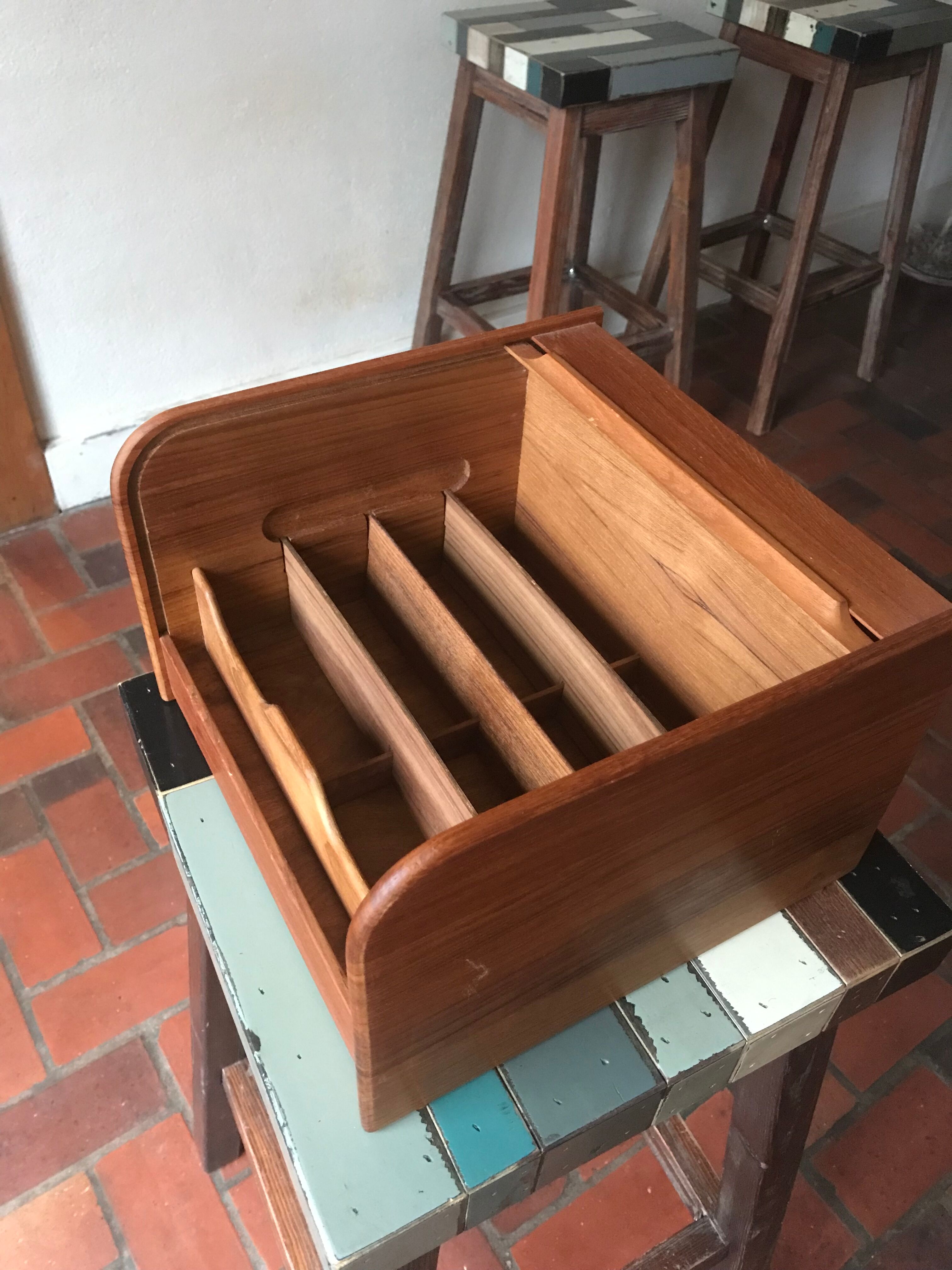Teak box with curtain door