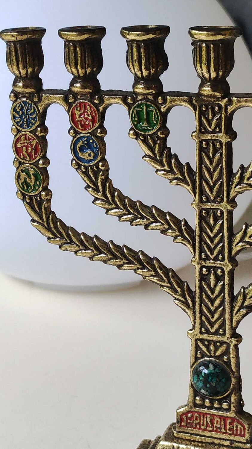 Menorah/Hebrew Candlestick with 7 branches. Astrological signs. Hanukkah. In patinated brass old gold