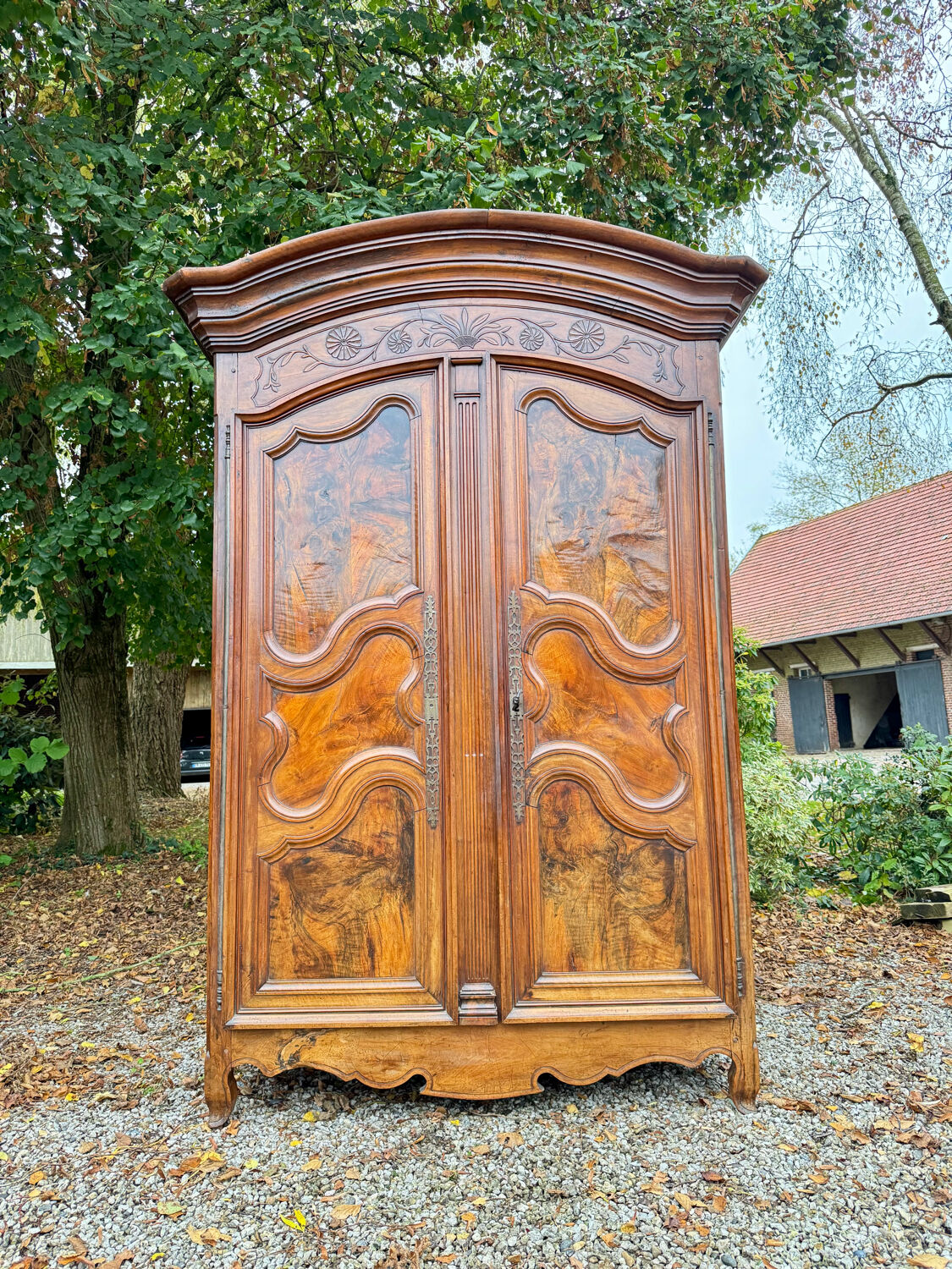Large gendarme hat cabinet in walnut from the louis period
