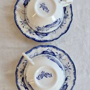 Old Lancaster cups and saucers in white earthenware with blue decoration.