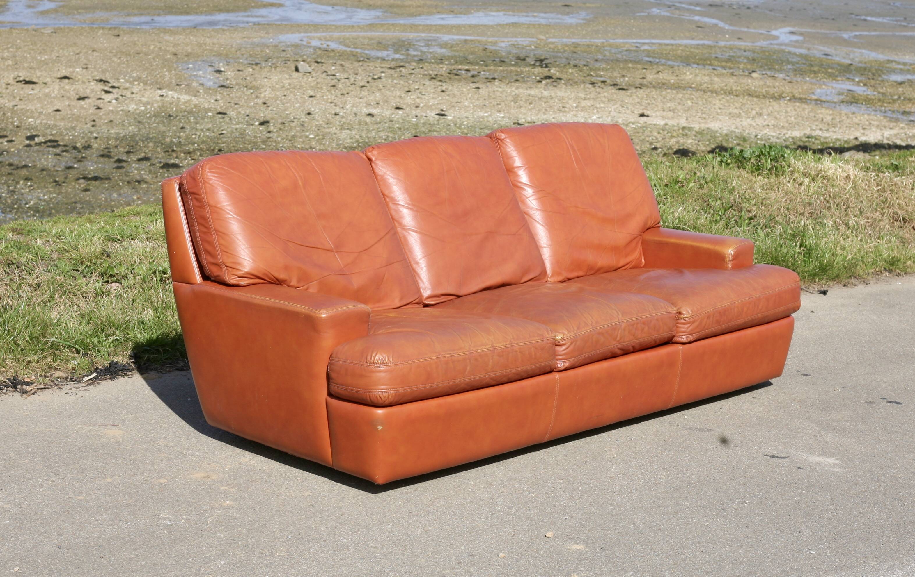 Space age sofa. Tan leather. Circa 1970