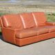 Space age sofa. Tan leather. Circa 1970