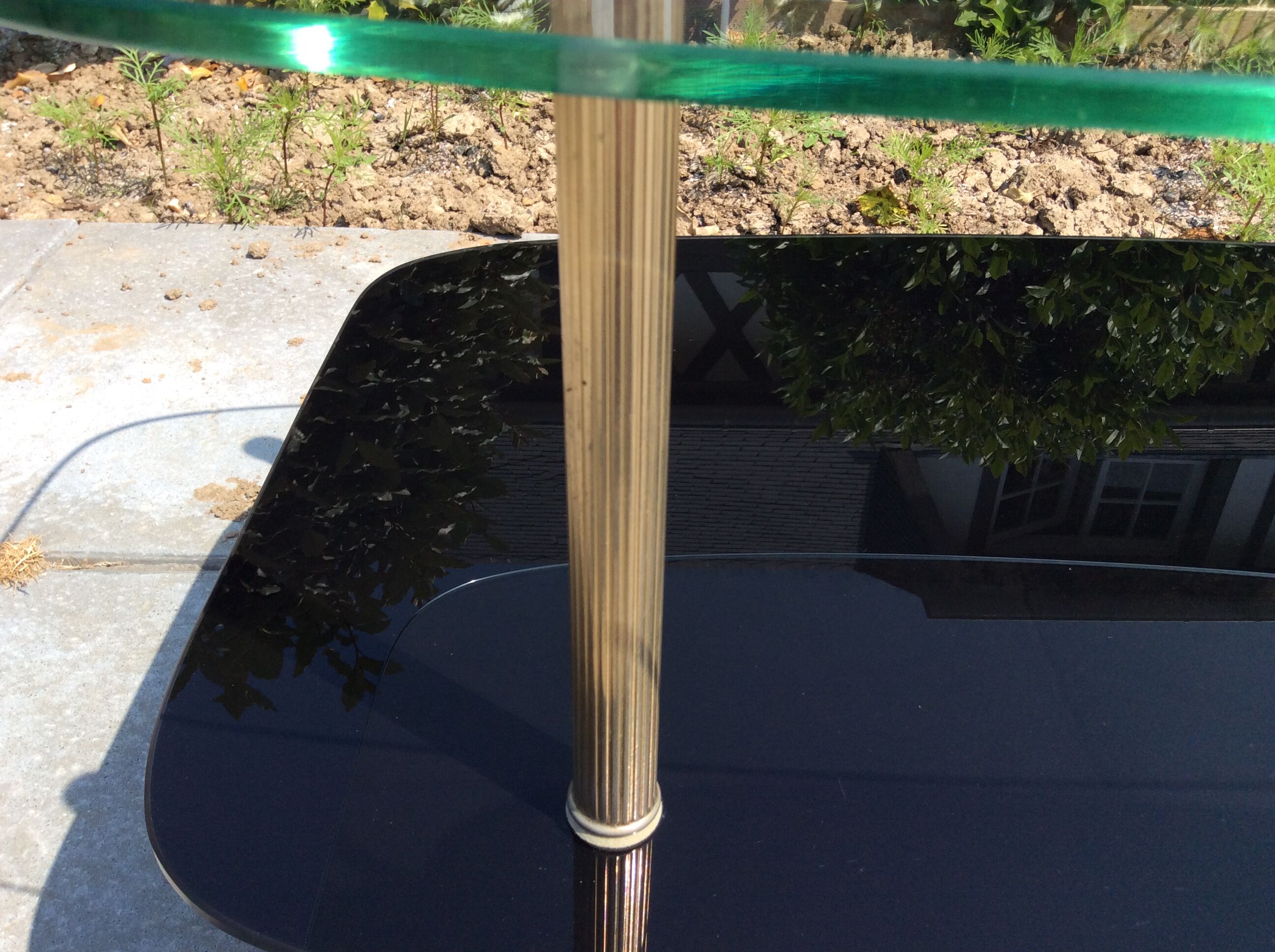 Glass and brass coffee table