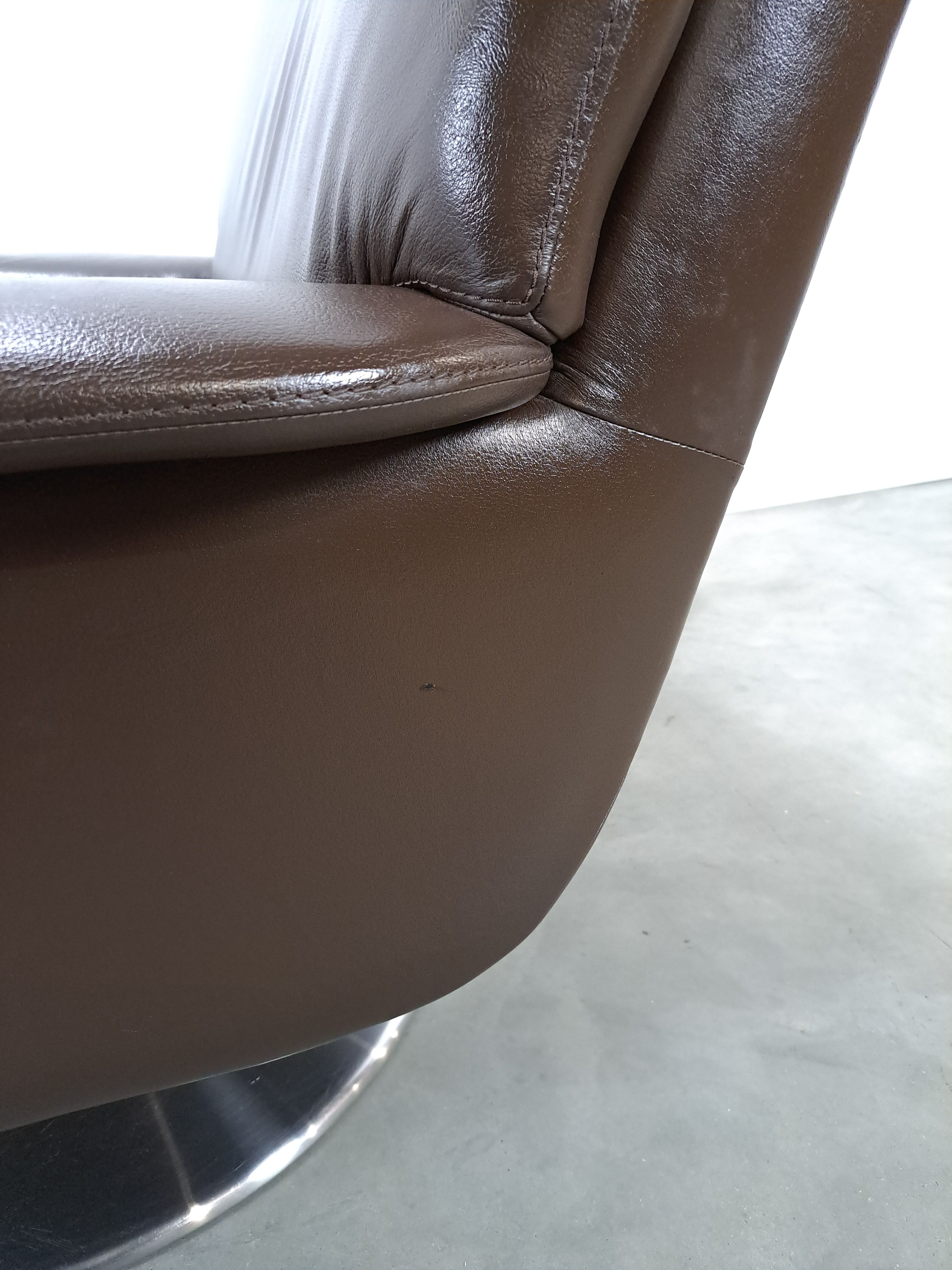 Brown leather swivel chair