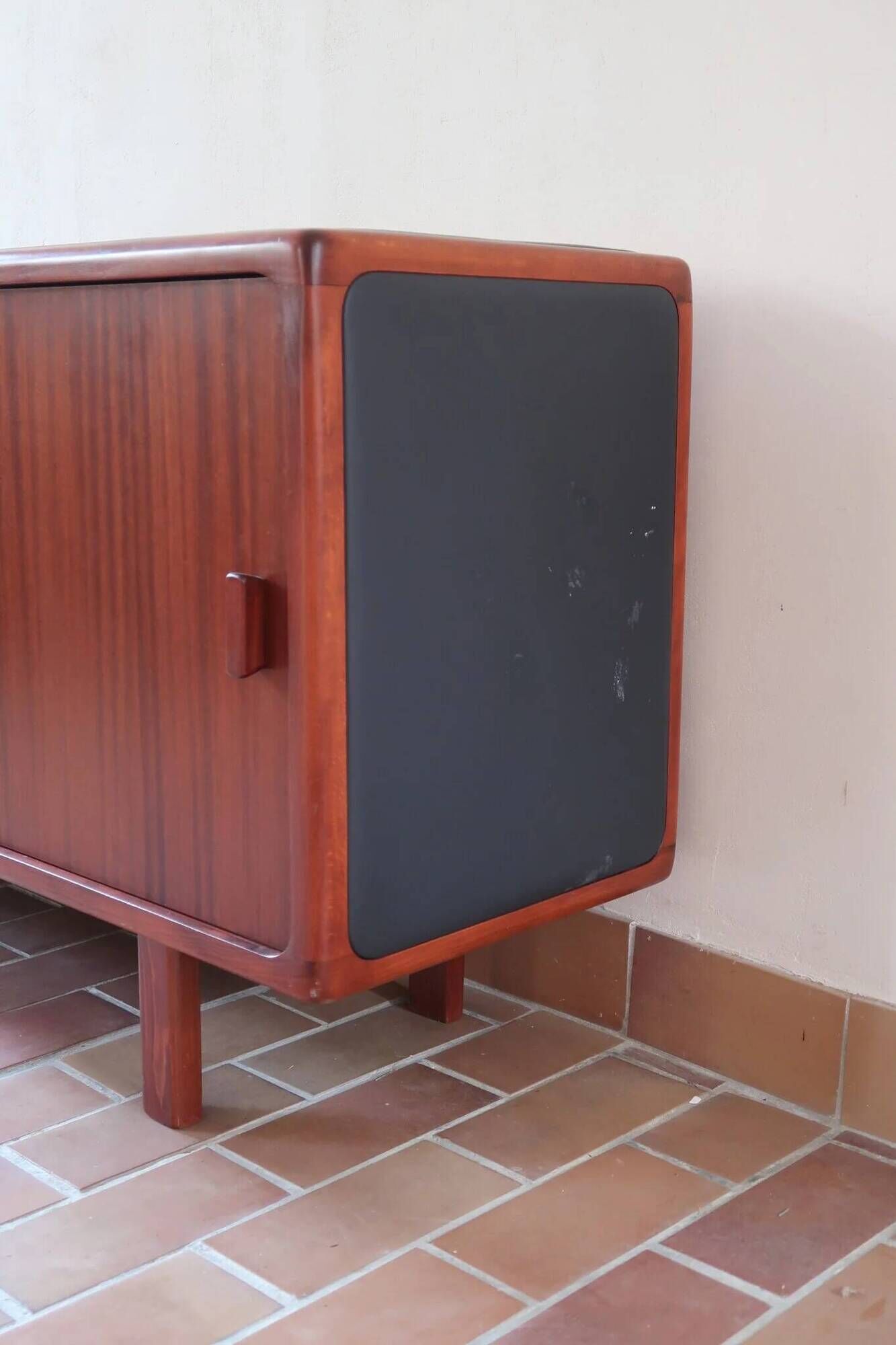 Teak enfilade, sliding doors, black faux leather top, 1970s.
