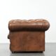 Brown cowhide leather chesterfield armchair  in English style on wheels