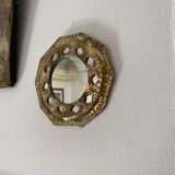 Antique mirror in worked brass