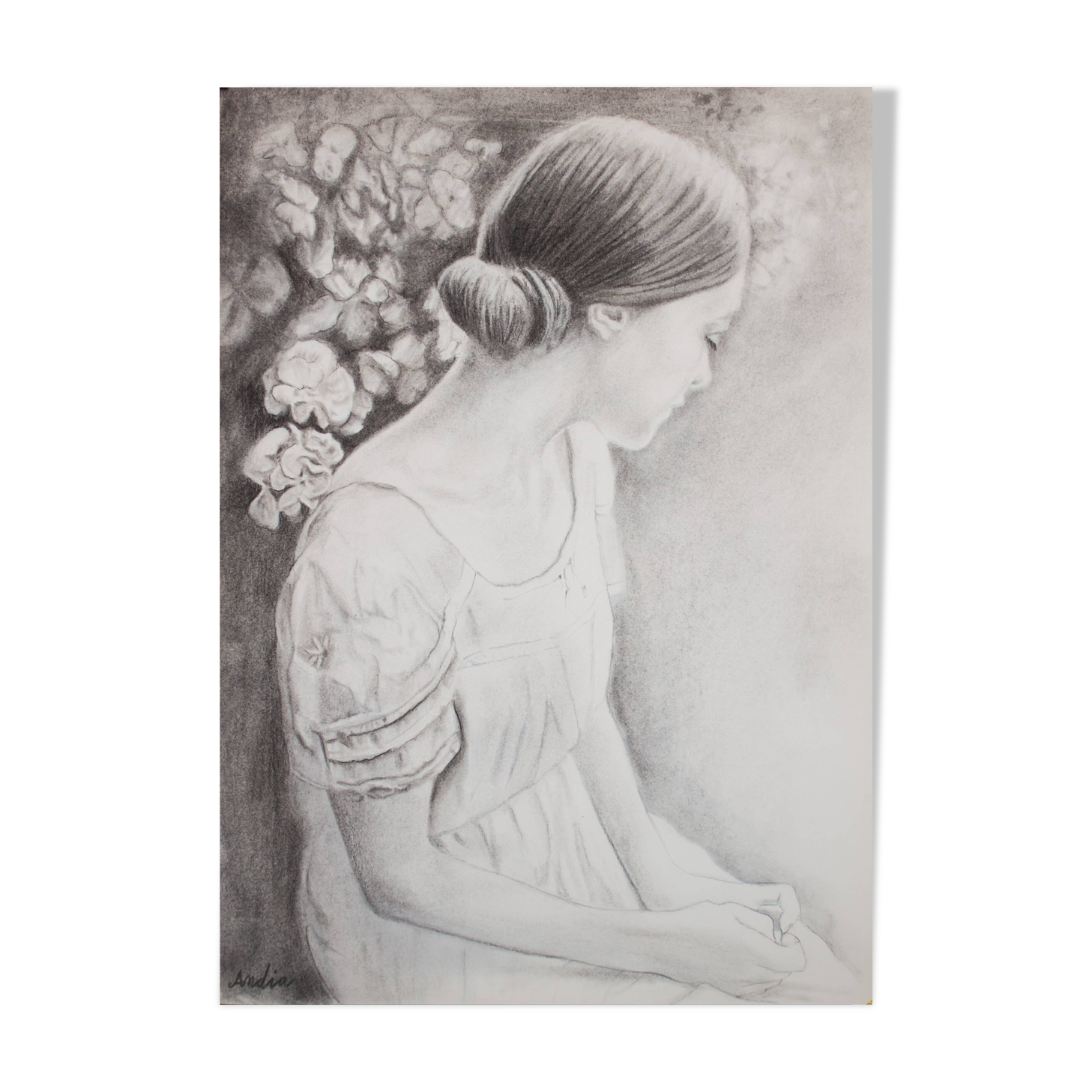 Charcoal drawing representing a young woman. Carbon paint.