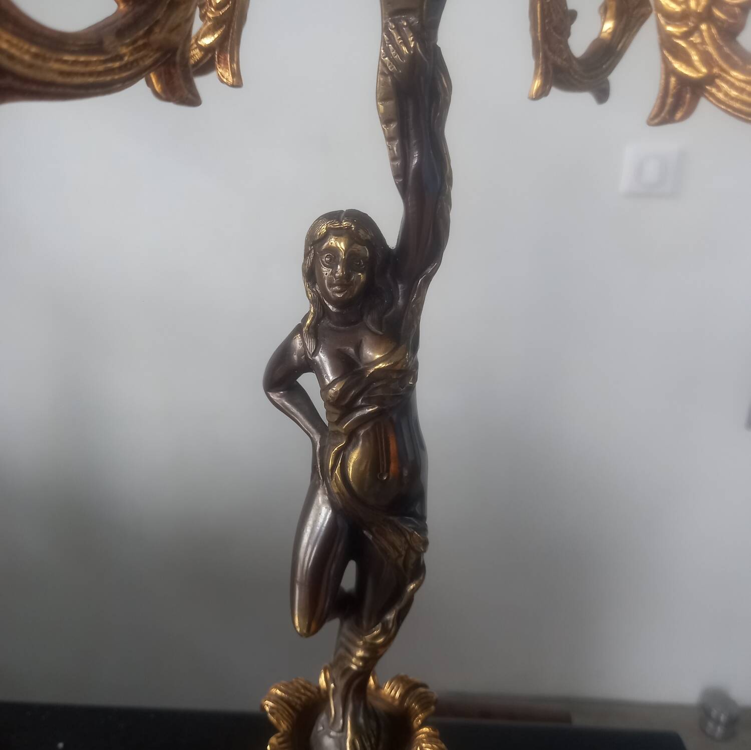 Pair of gilded bronze candlesticks with nude women