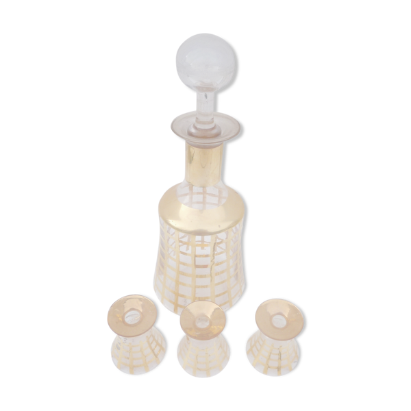 Ensemble à liqueur en verre doré strié carafe et 3 verres