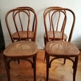 Series of 4 cane bistro chairs