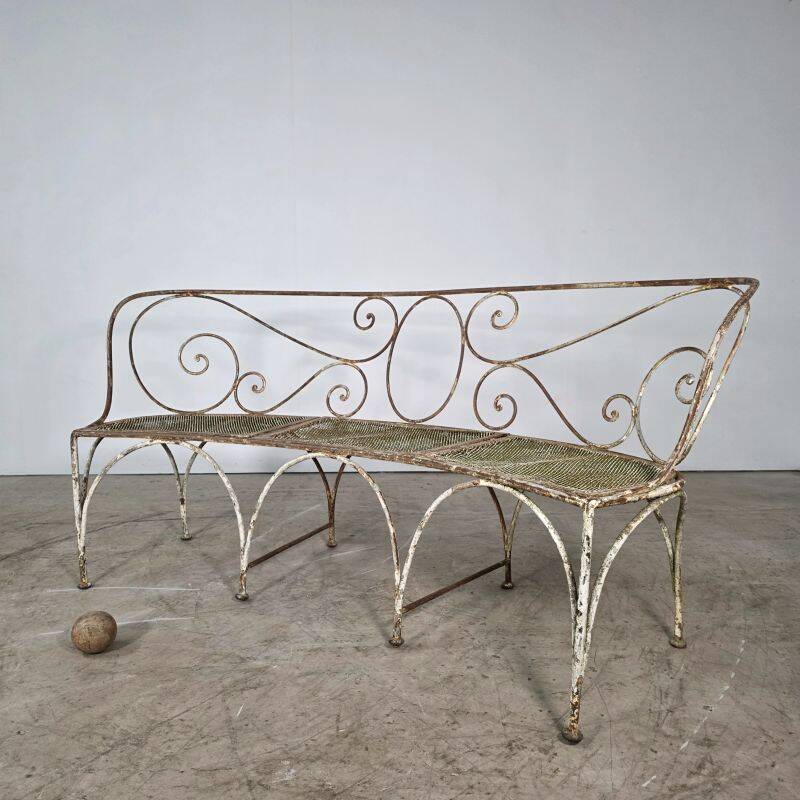 Beautiful curved garden bench from the late 19th century in iron.