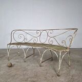 Beautiful curved garden bench from the late 19th century in iron.