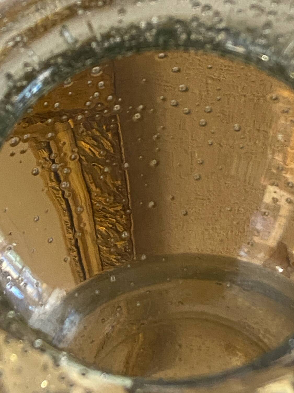 Blown and bubbled glass ball vase