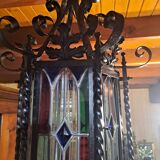 Wrought iron lantern with colored stained glass