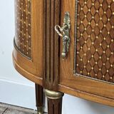 Half-moon commode in the Louis XVI style
