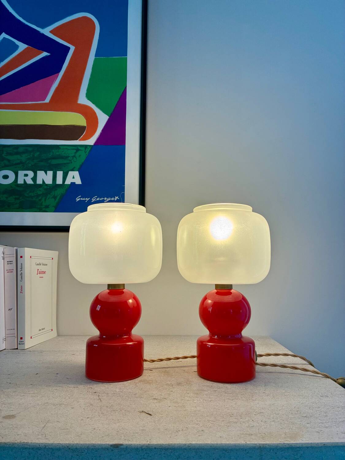 Pair of bright red glass "Globes" bedside lamps, 1960