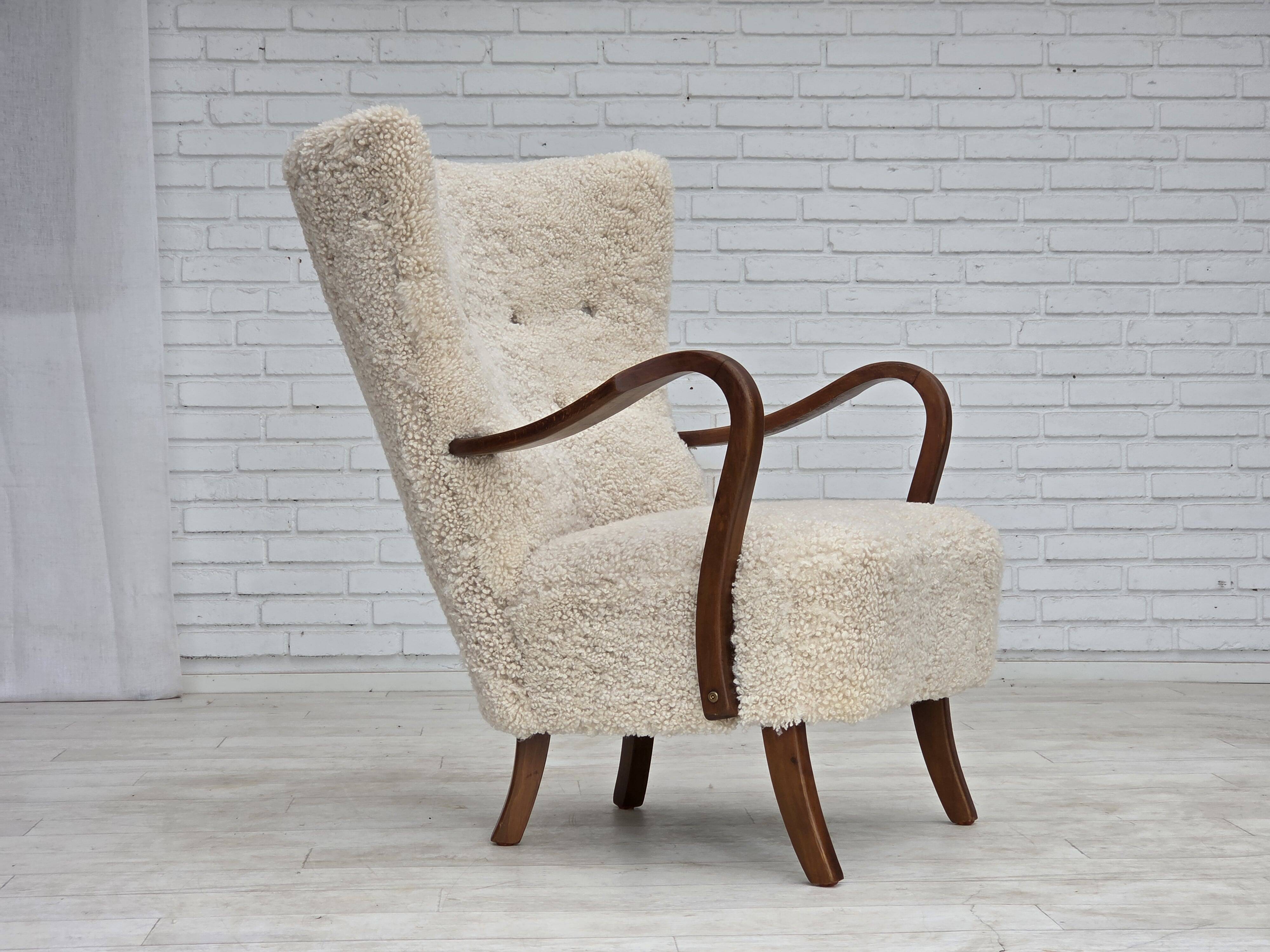 1960s, Danish design by Alfred Christensen, reupholstered, sheepskin.