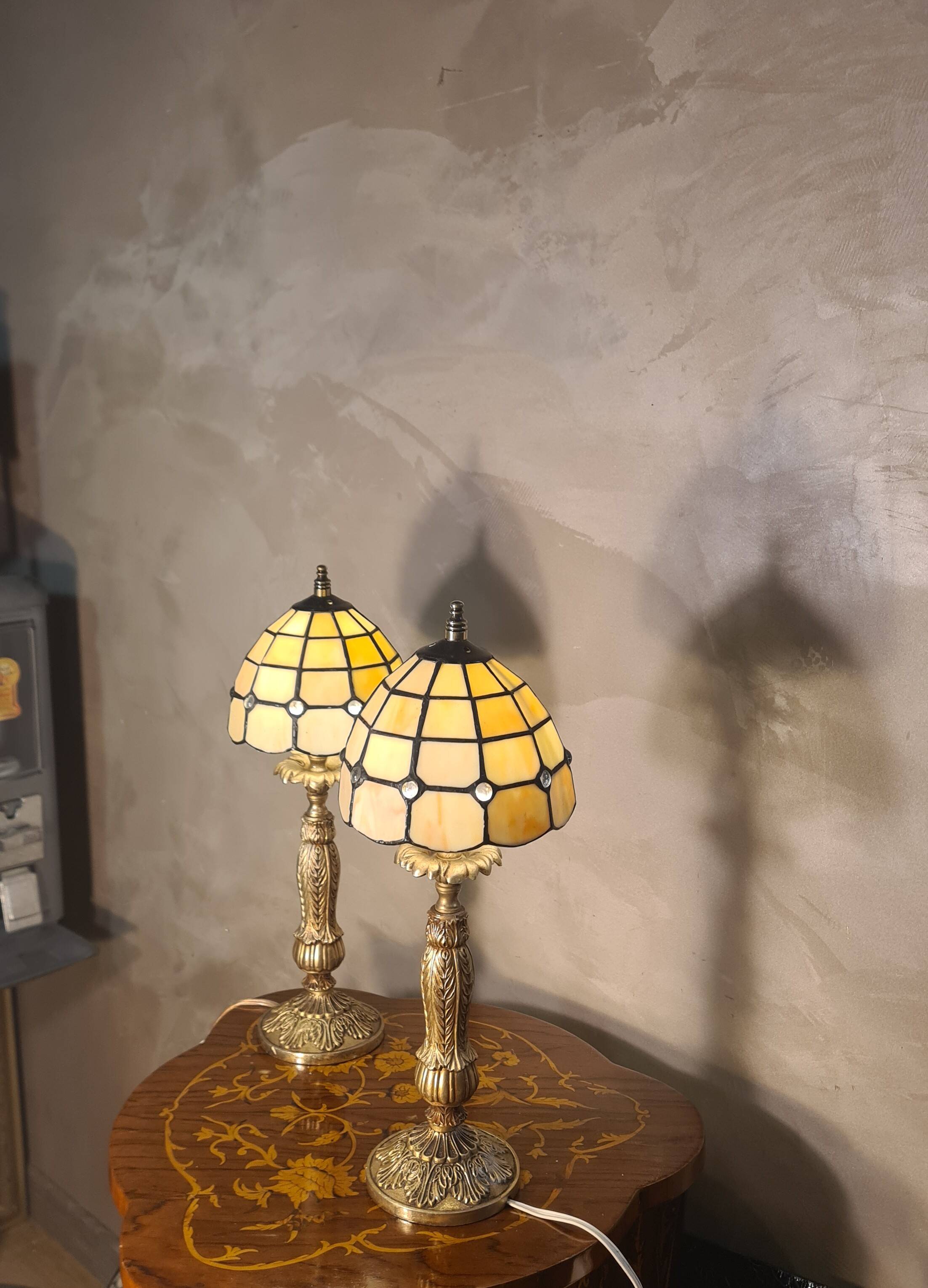 pair of bedside lamps in gilded bronze with glass shade