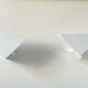 Pair of vintage geometric wall lights, matte white, France 1970