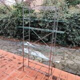 Modular metal chrome and vintage glass shelves from the 1970s.