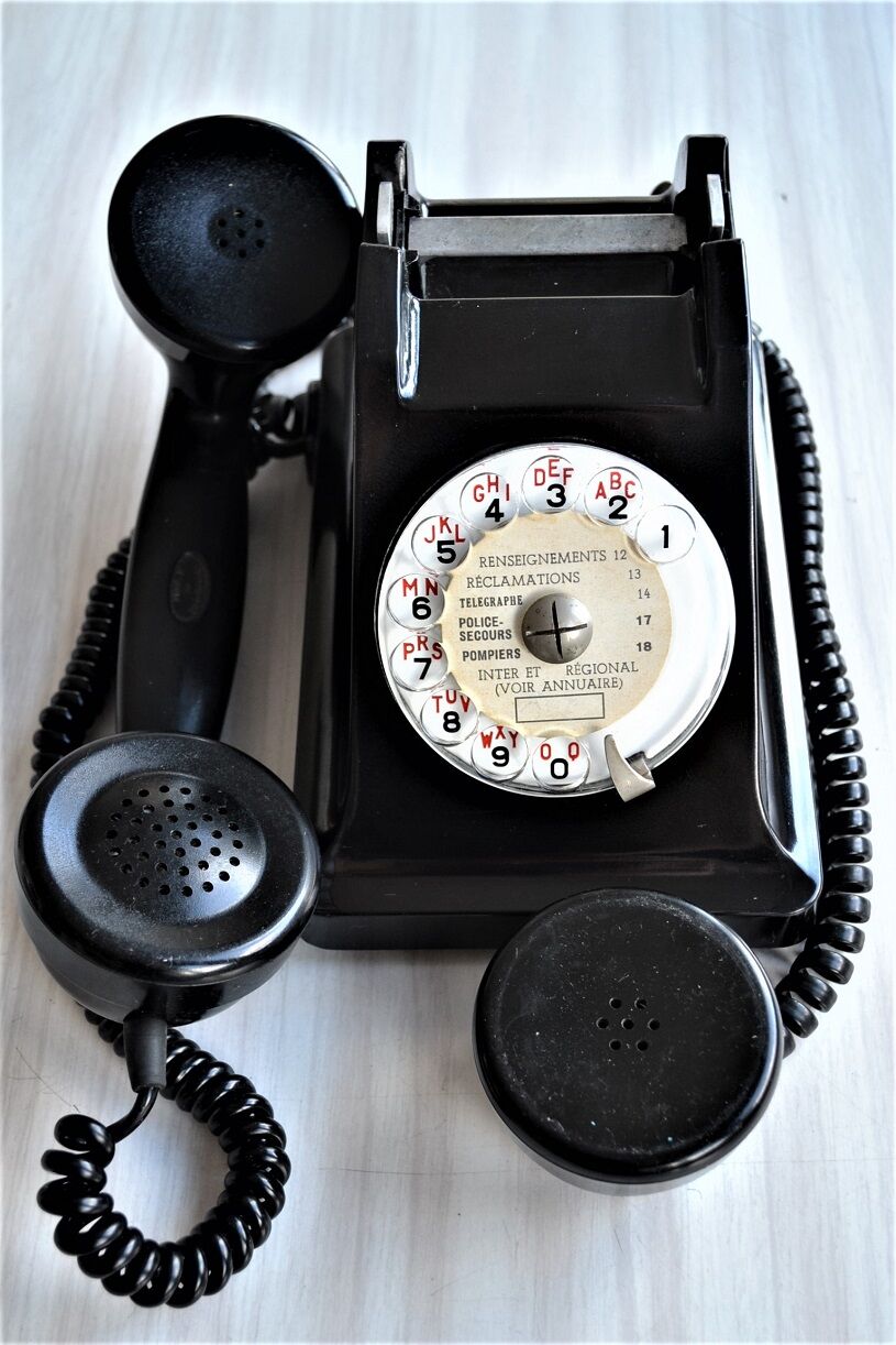 Bakelite dial PTT phone with 1960s vintage earpiece