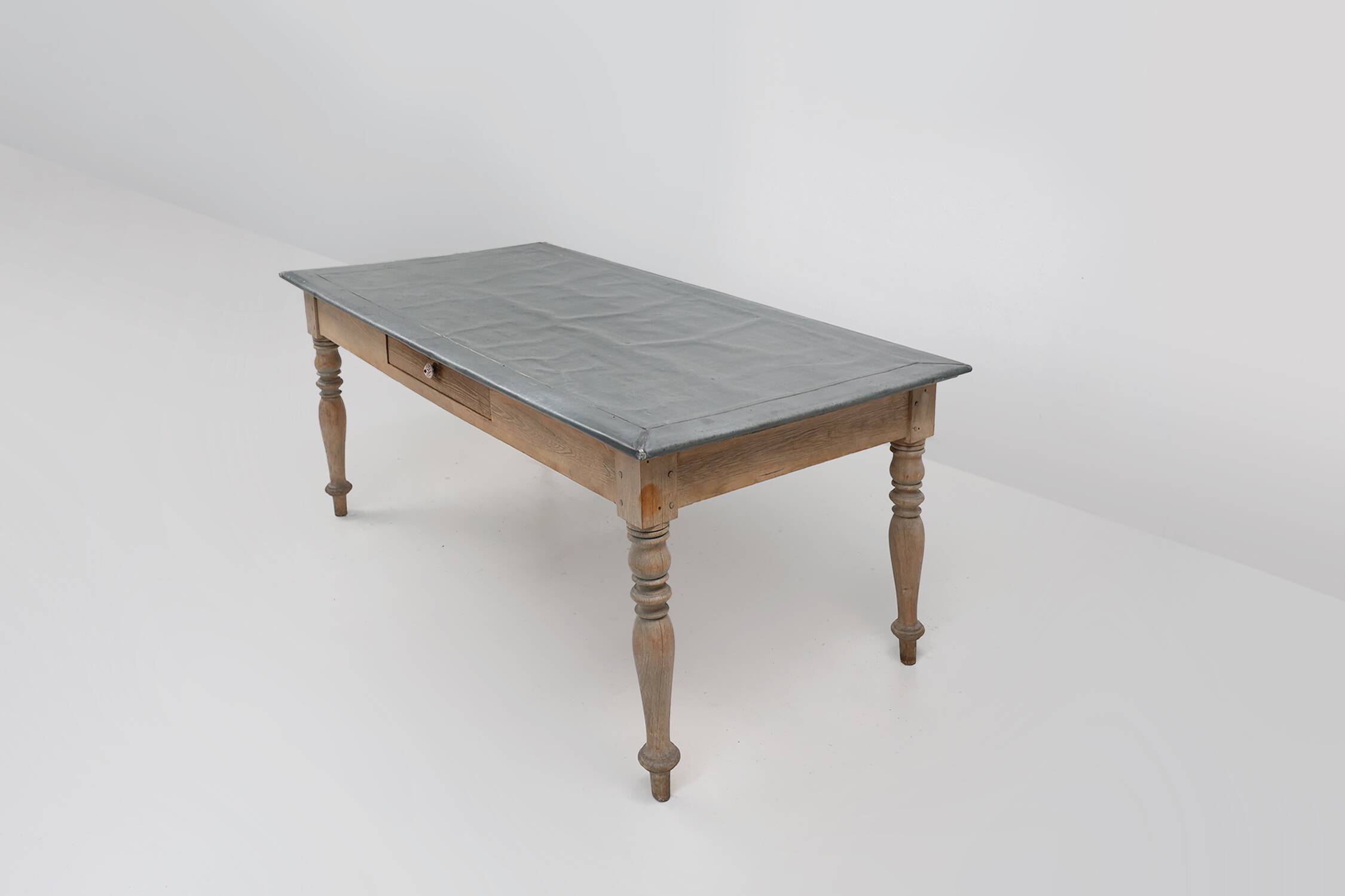 Rustic French pine wood dinner table with zinc top, ca. 1850