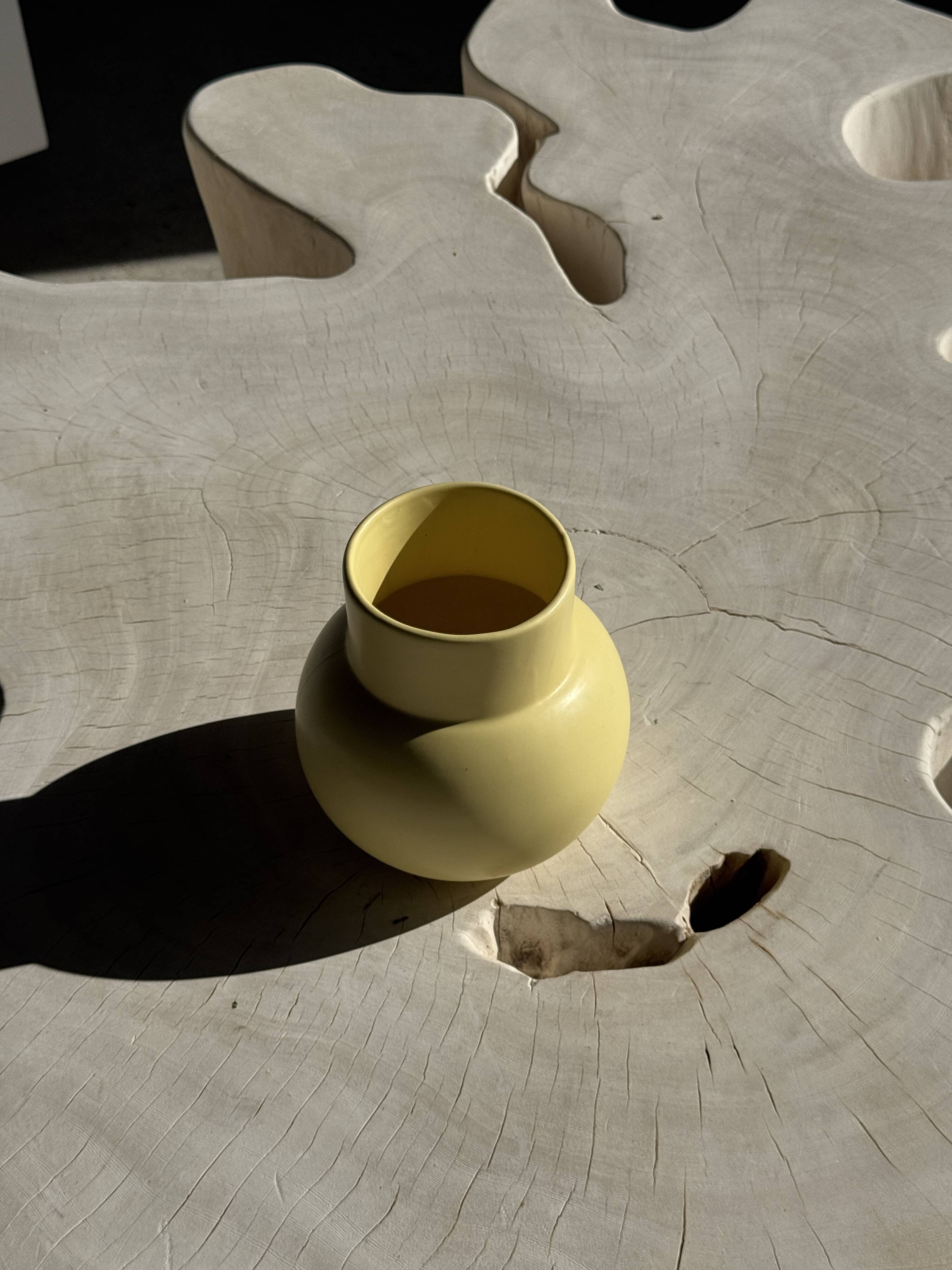 Small light yellow ball vase