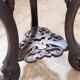 Antique carved side table with Indochinese inspiration, made of blackened wood