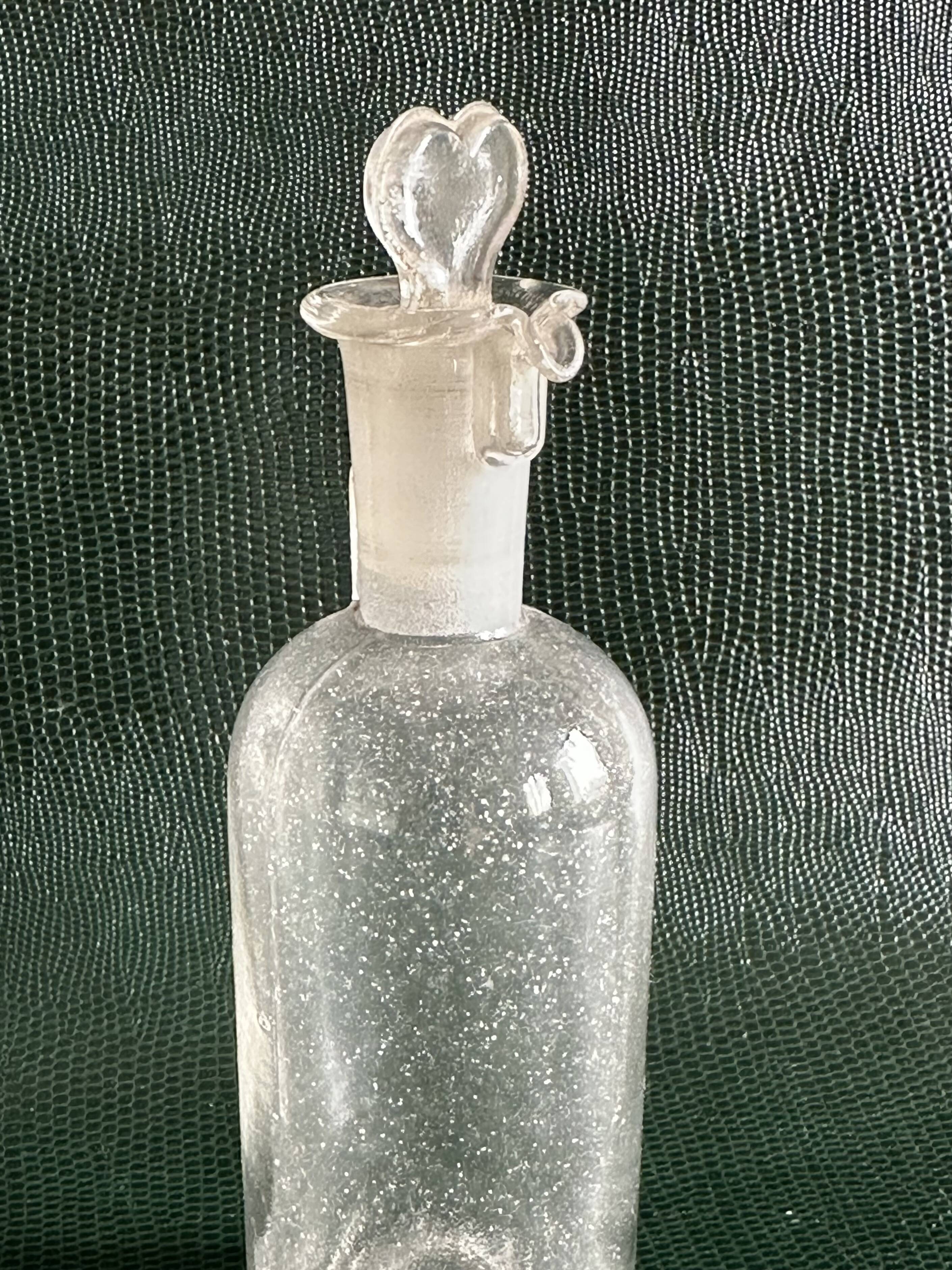 Flacon d’apothicaire ancien en verre, vers 1900