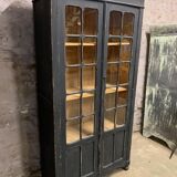 Former black patinated showcase